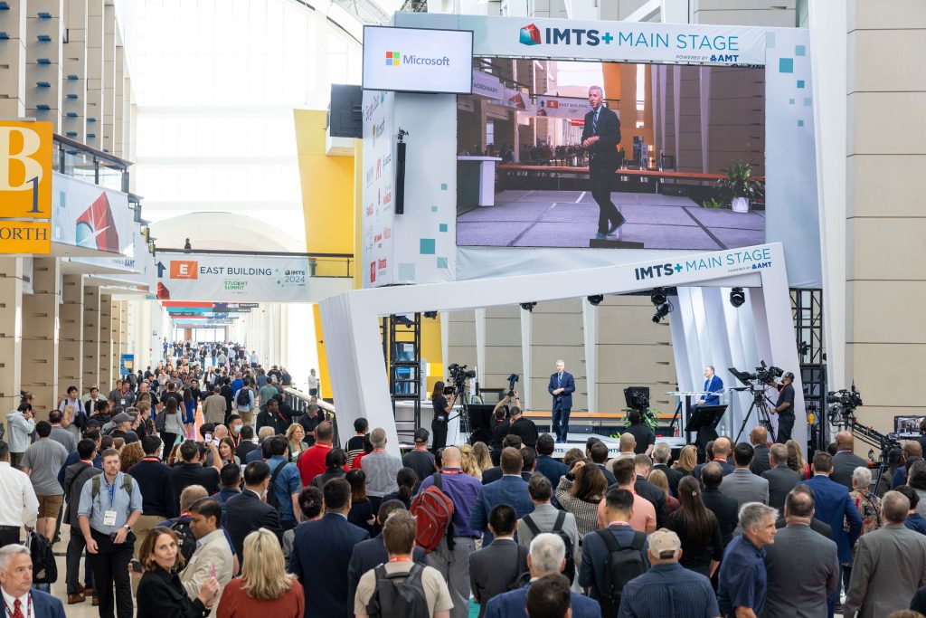 Doug Woods, AMT President on opening day at IMTS 2024. Photo via IMTS.