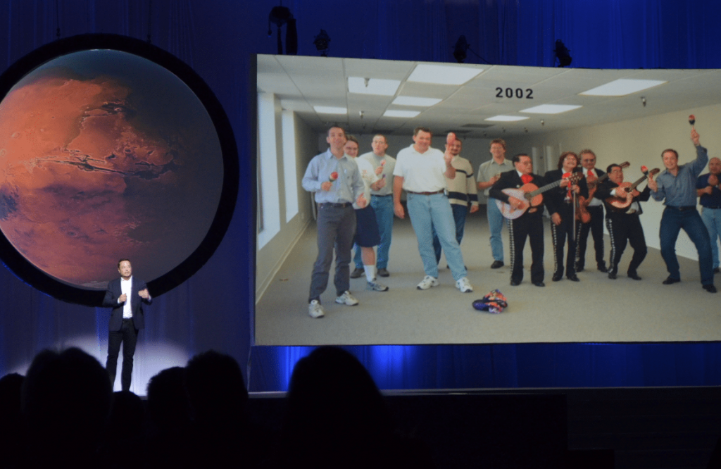 Elon Musk describing how SpaceX started with a carpet and a Mariachi Band. Photo by Michael Petch.